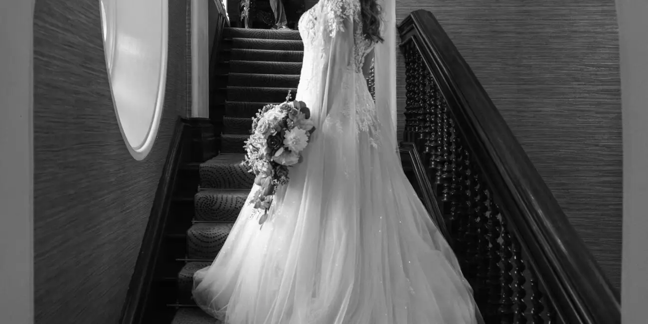 Bride & Groom timeless portrait on a staircase